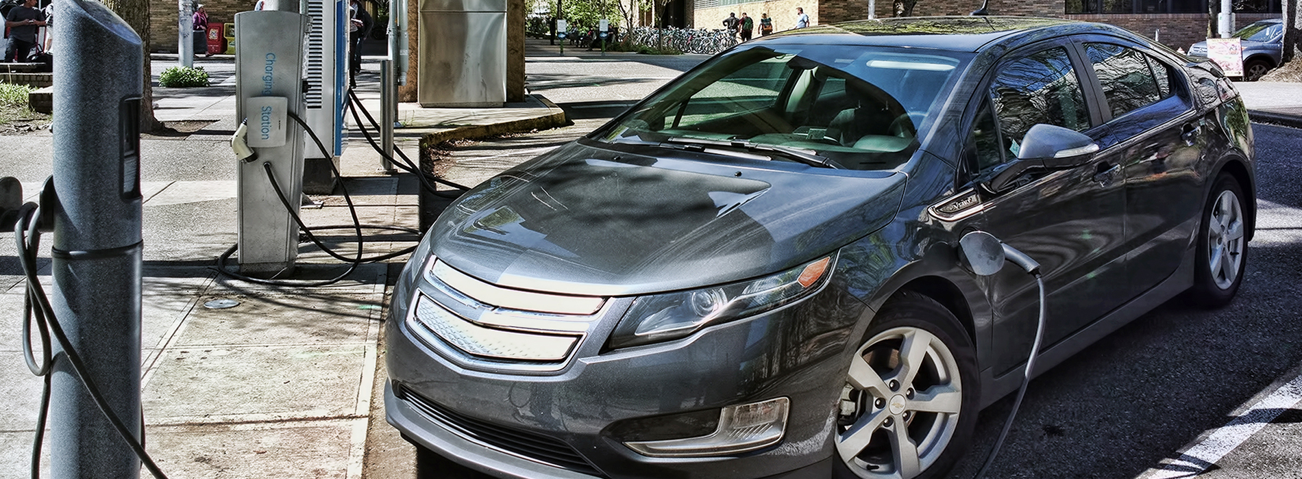 Electric car connected to charging equipment in Portland, Oregon